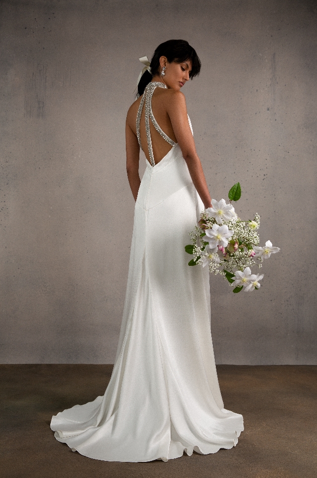silk like gown flowing with thick diamante straps on back
