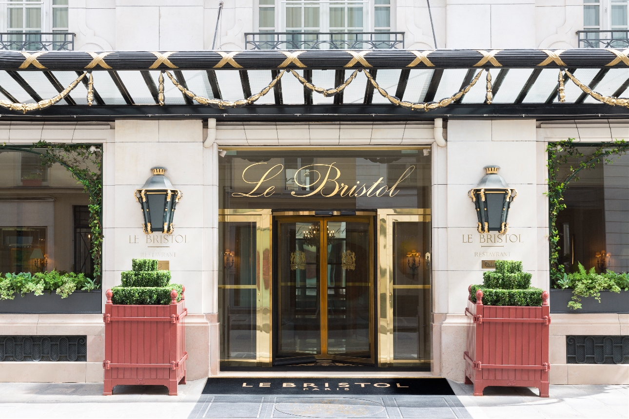 hotel restaurant front, gold doors, historic and luxurious